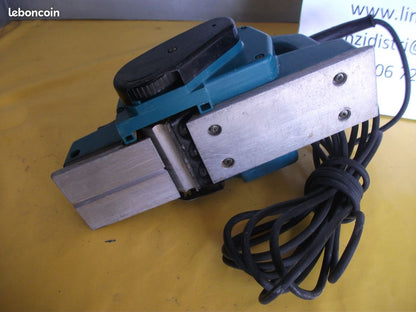 Rabot MAKITA 1923H – 82 mm – 850 W Occasion très bon état.